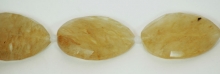 Kwarc barwiony - kremowe smugi, owal skręcony (40x30x11 mm)